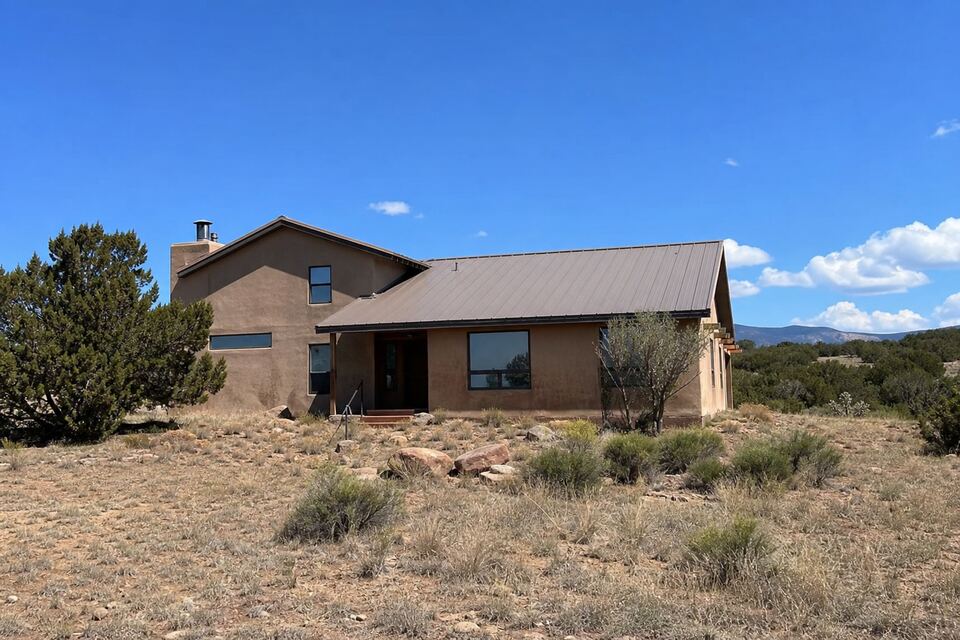 Stucco home exterior typical of Eldorado, New Mexico